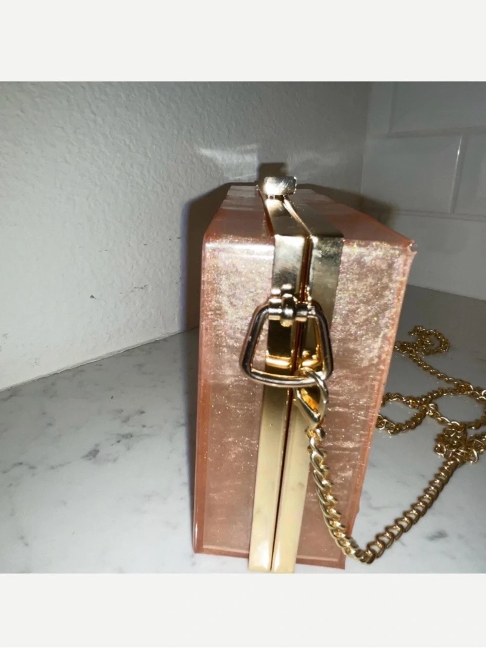 Peach Rose Gold Resin Clutch Handbag with a Gold Long Chain and Frame